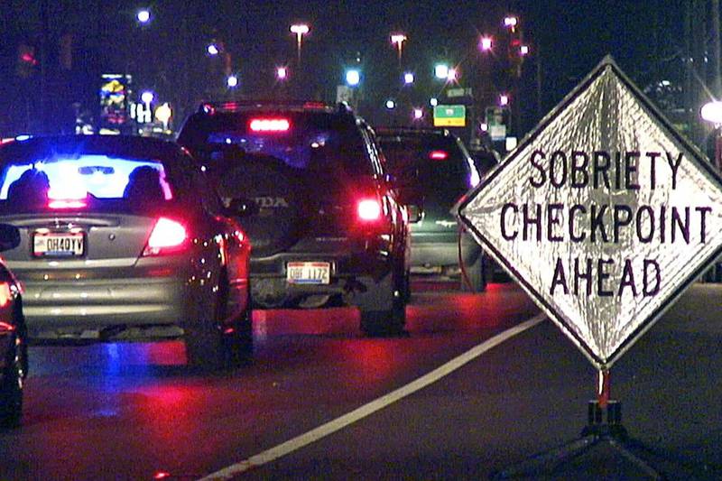 A sign warns motorists as they approach a sobriety checkpoint on State Route 4 in Fairfield, Ohio.