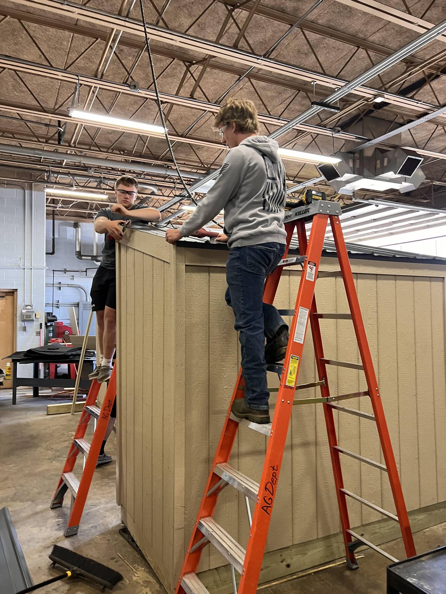Students in the Oregon High School ag construction class had some hands-on learning about roofing, siding and framing as they assembled four wooden shelters that house mini free food centers. Seth McMillan’s 2023-2024 class had 19 students. The enrollment for 2024-2025 has more than doubled, with 45 students in the class, which will be split into two sections.