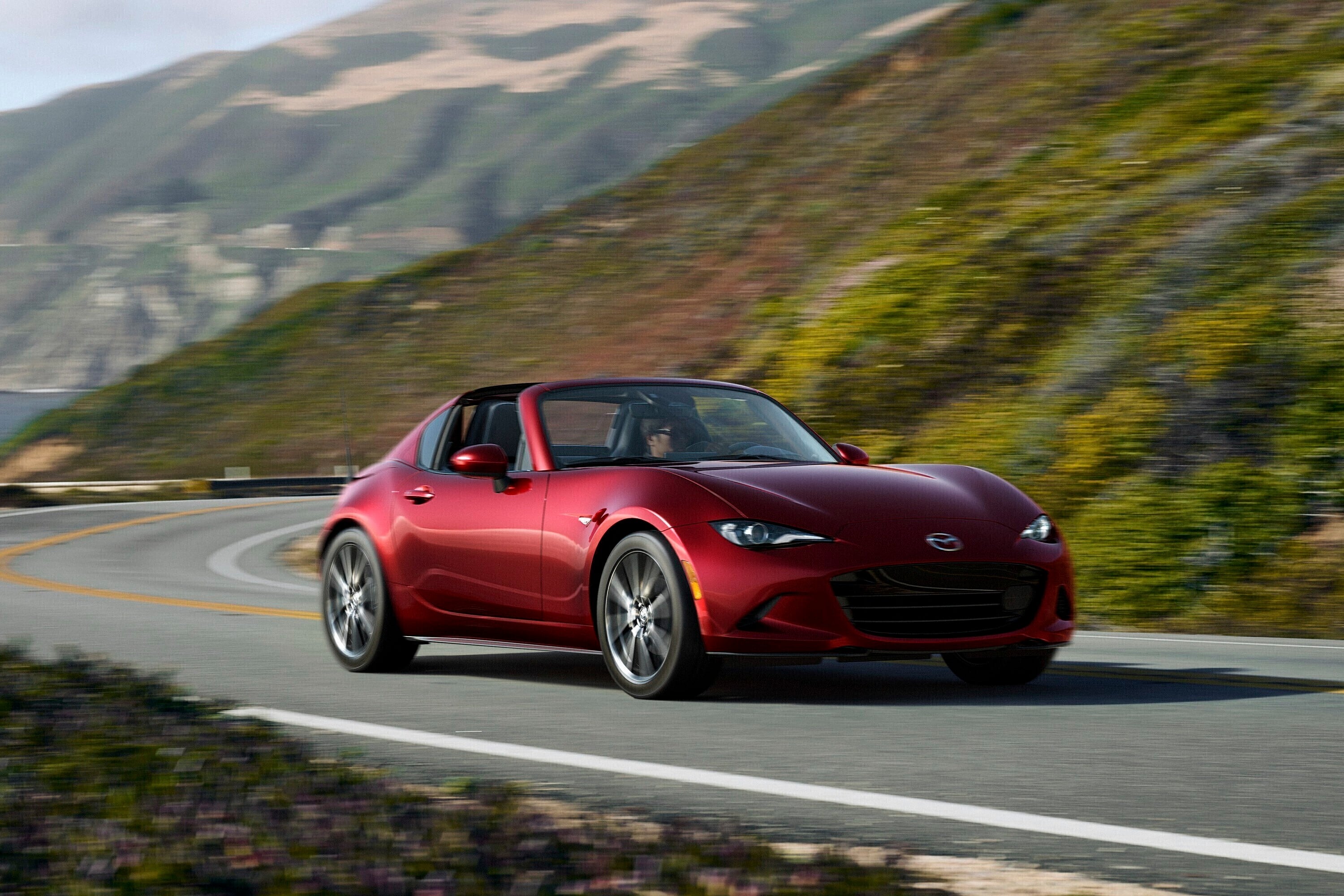 The refreshingly pure and elemental 2024 Mazda MX-5 Miata is proof that you don’t need go-faster tech to have a great time.