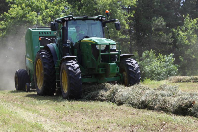 Making hay is Mitchel Rahn’s favorite time of the year. Harvest of the first cutting of alfalfa was completed in May and now the Rahns are working to finish the first cutting of grass hay. They typically harvest four cuttings of alfalfa and two cuttings of grass hay each season.