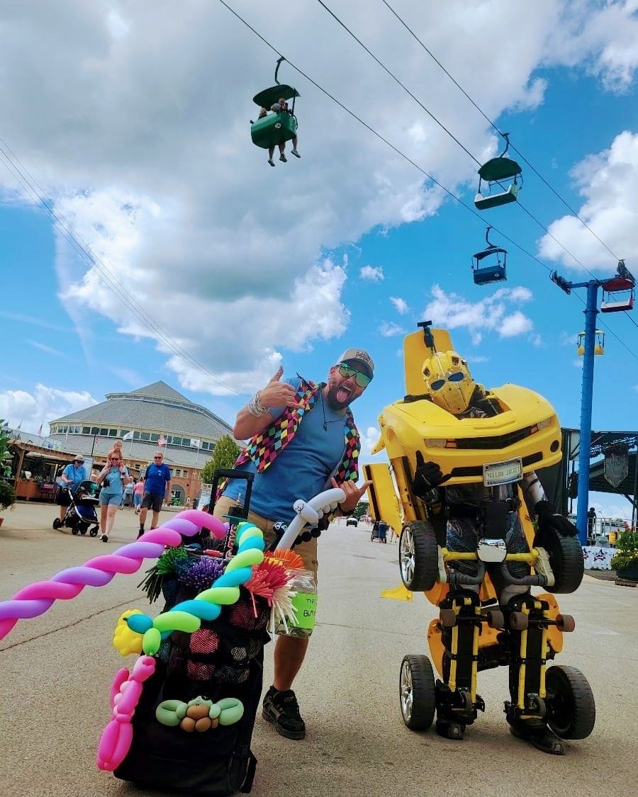 Keep an eye out for these guys roaming around the Illinois State Fair — one transforms balloons into fun shapes, and the other switches between vehicle and human right before your eyes.