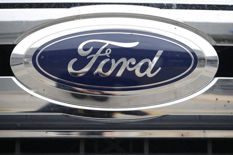 The Ford company logo is pictured at a Ford dealership in Littleton, Colorado.