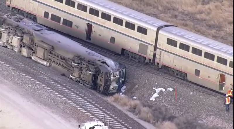 Emergency responders look over an Amtrak train derailment near Keenesburg, Colorado.