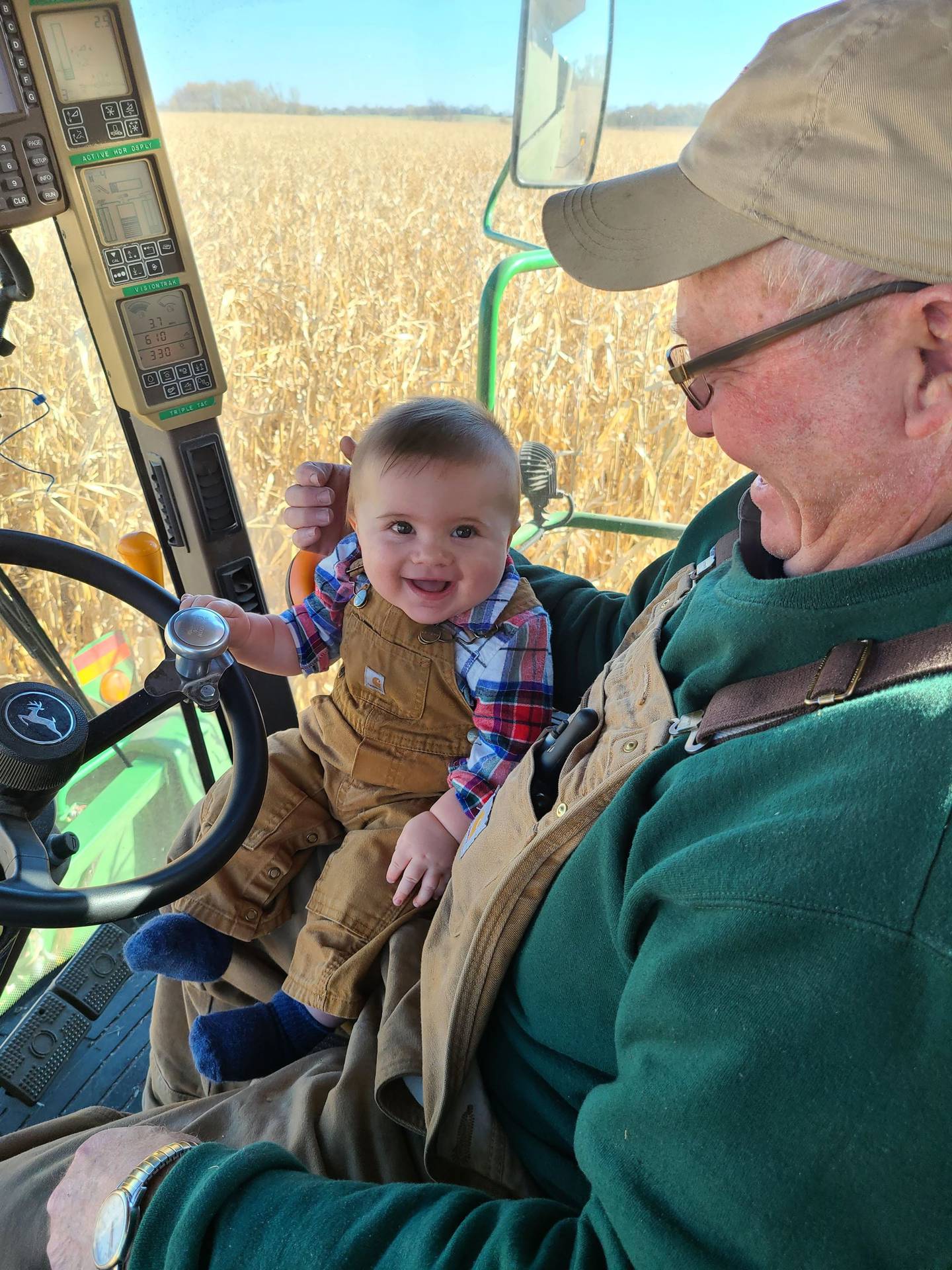 “First Harvest” — Erin Muffler: “This image captures my son, Max, during his first ride in the combine during harvest. He smiled the whole ride. He was 5 months old in this picture.”