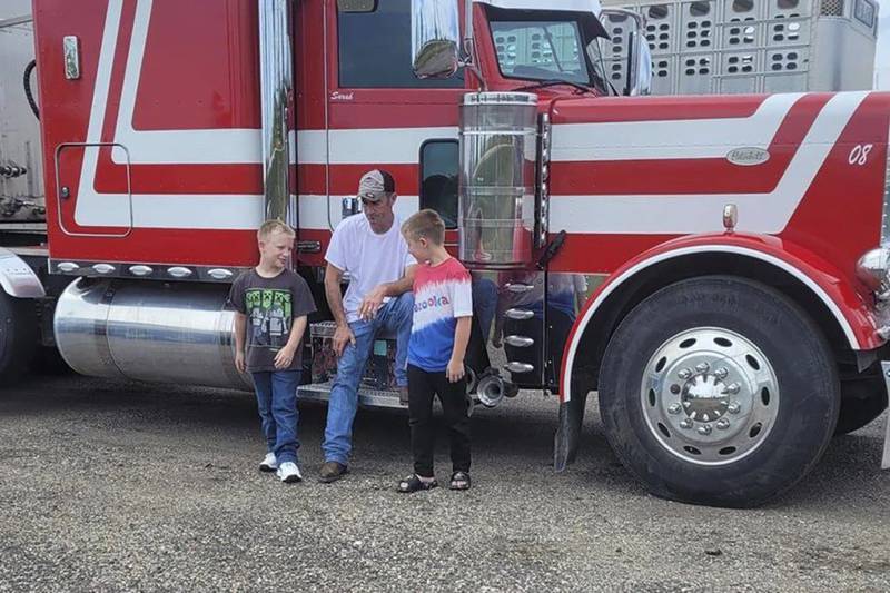 This undated family photo shows David Schultz with his two sons.