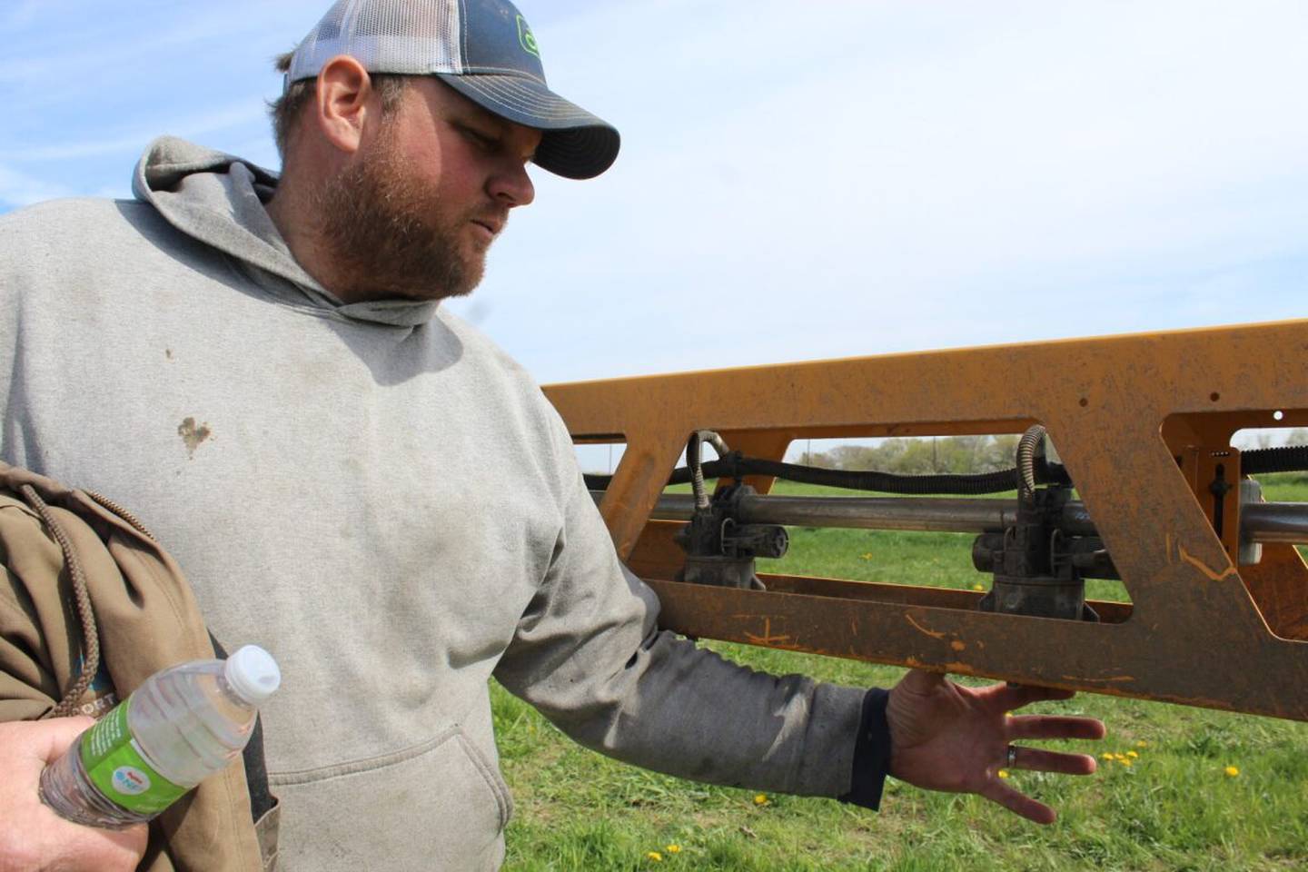 Each nozzle body on the Hagie sprayer is individually computer controlled, explains Correy Rahn. The technology built into the self-propelled sprayer with a 120-foot boom has improved his spraying efficiency by one-third.