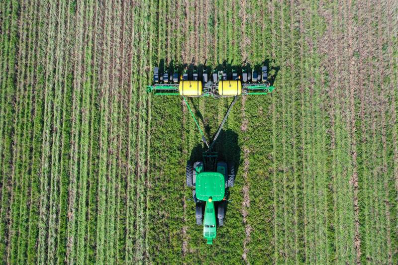 Brad Hunter plants corn into a stand of cover crop on his farm in Porter County last year.