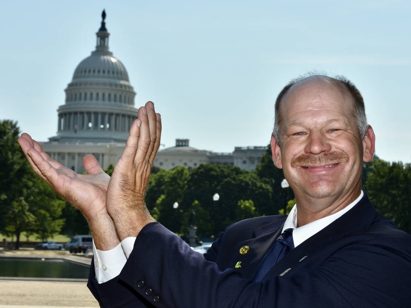 Mike Koehne, a first-generation farmer in southeast Indiana, has some fun posing for a picture in front of the Capitol. He is an active member and recent officer of the Indiana Soybean Alliance, serves on the American Soybean Association’s board of directors and on the Soy Transportation Coalition and was recently appointed to the U.S. Soybean Export Council’s board of directors.