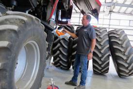 Combine fire threat: Keep machine clean with leaf blower