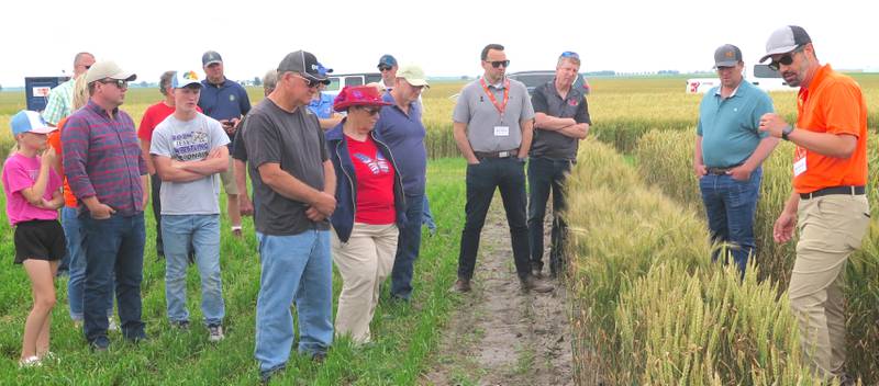 Mark Christopher (right), KWS Cereals senior wheat breeder, leads one of the groups on a tour of the 50-acre breeding nursery east of the company’s breeding facility in rural Champaign, Illinois.