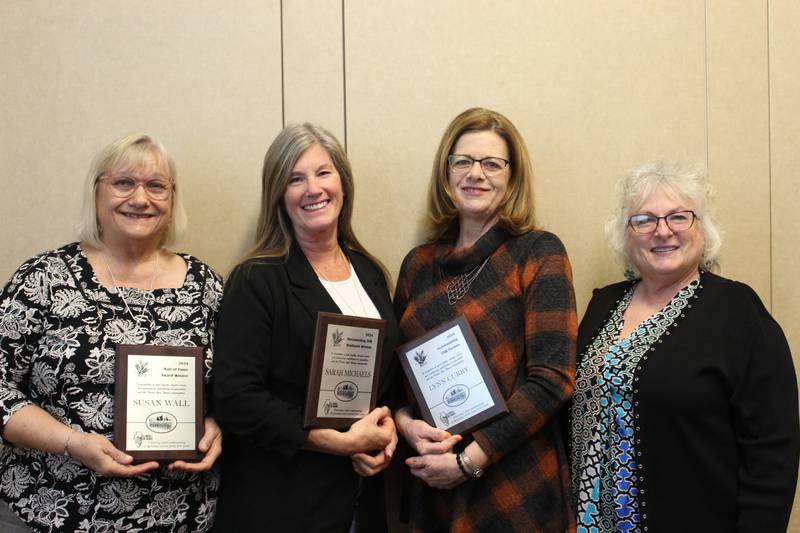 Diana Ropp (far right) presents awards to three exceptional Illinois Agri-Women members during the group’s annual meeting. Members receiving special honors are: Susan Wall (from left), Hall of Fame winner; Sarah Michaels, Outstanding Business Women; and Lynn Curry, Outstanding Farmer.