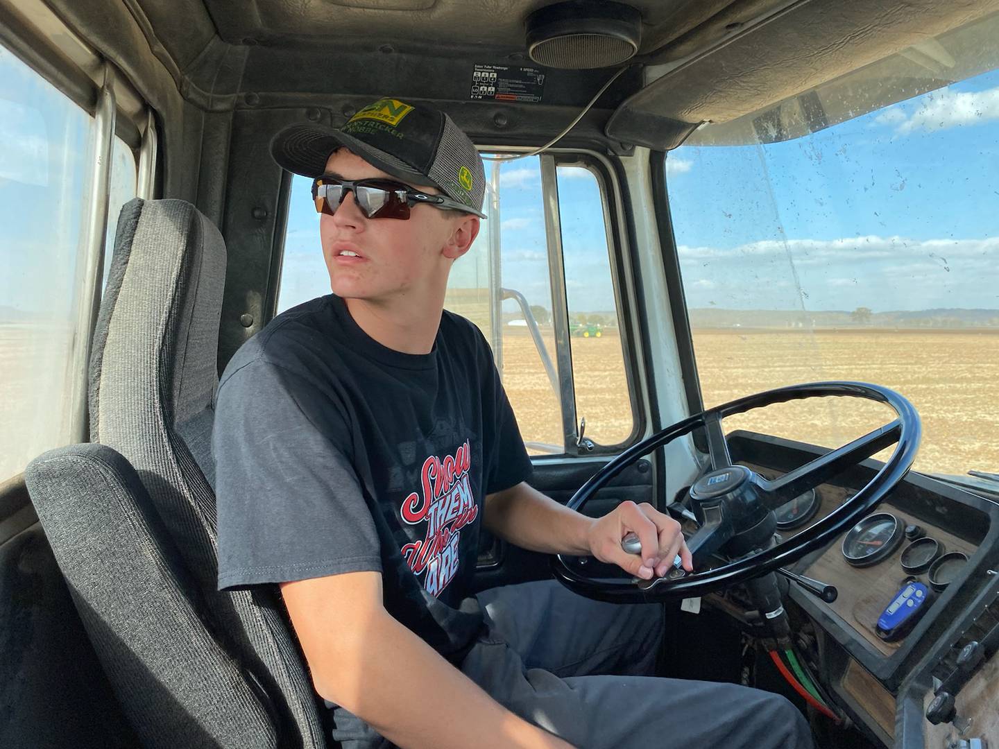 Brady Heins works on his family farm with several family members and does a variety of tasks involved with raising crops including operating machinery.