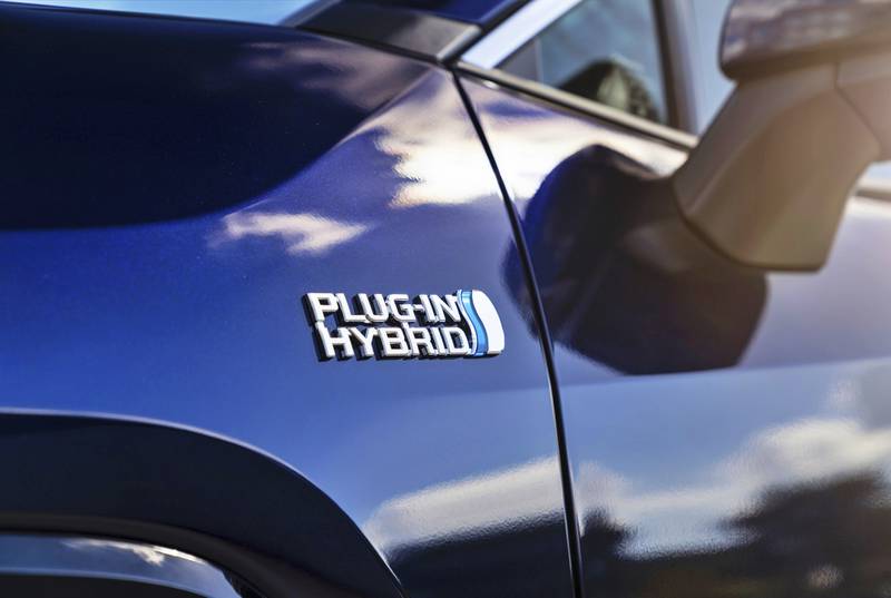 This photo provided by Toyota shows the badge of a 2023 RAV4 Prime, a plug-in hybrid that offers the ability to drive up to an EPA-estimated 42 miles on electricity before the gas engine kicks in.