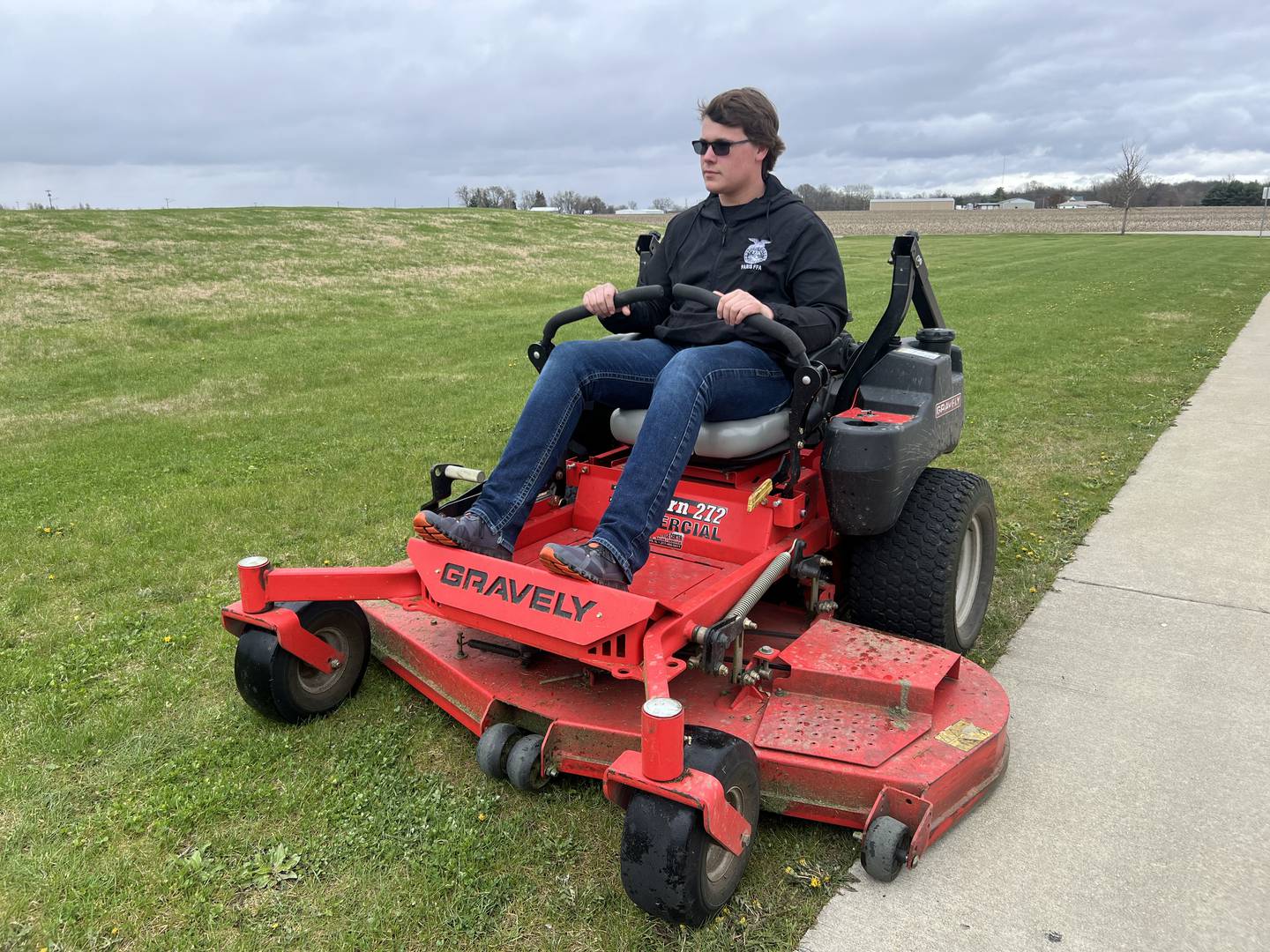 Logan Dick mows lawns and does a variety of landscaping jobs for his customers. He recently started to offer excavation services through his Dick’s Lawn Service business.