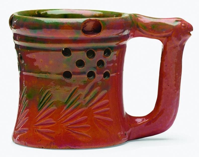 George E. Ohr’s pottery can be recognized by its thin clay, vividly colored glaze and an overall sense of eccentricity.