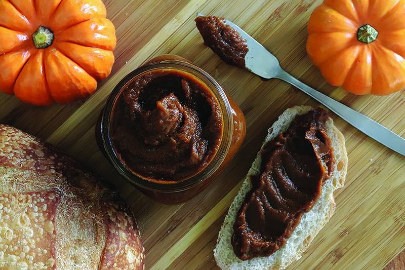 Spiced homemade pumpkin butter is a fun and tasty topping for toast and baked goods and even to swirl into a yogurt parfait.